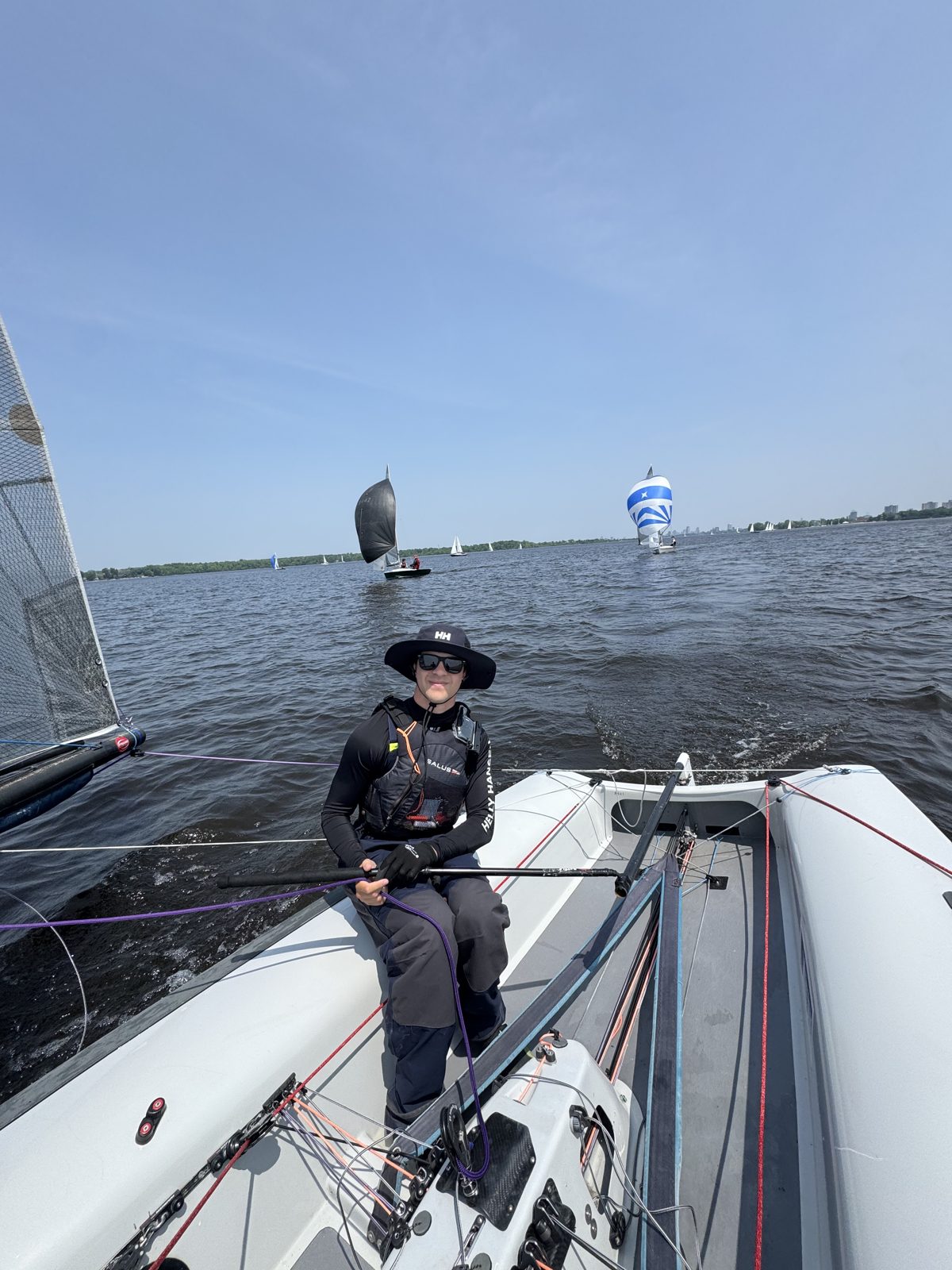 Sailing a fully rigged 505 dinghy on the water